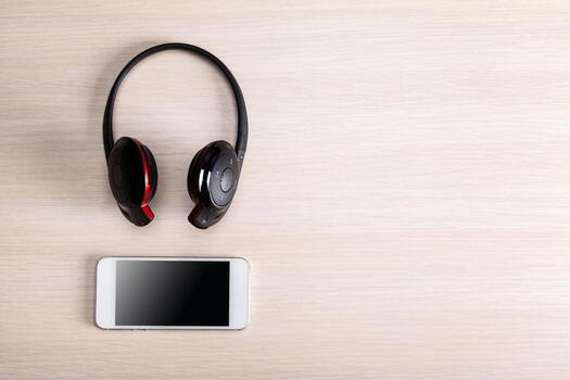 headphones on wooden background photo