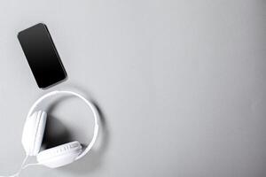 Audio Headphones with Cord on Grey Background photo