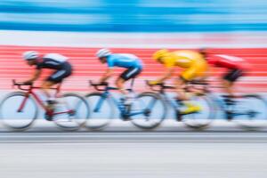 Competitors racing on a cycling track during an intense competition in vibrant colors and dynamic motion capture photo