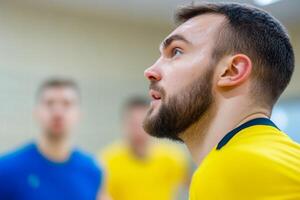 Athlete focusing intently during a basketball practice session in a gymnasium setting photo
