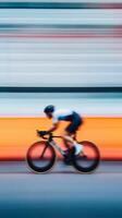 A cyclist speeds around a track, showcasing agility and skill at a cycling event photo
