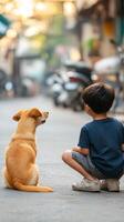Child and dog enjoy a quiet moment together on a bustling street in the evening light, showcasing their bond and curiosity photo