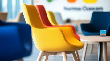 Brightly colored chairs arranged in a modern classroom designed for creativity and collaboration in an educational setting photo