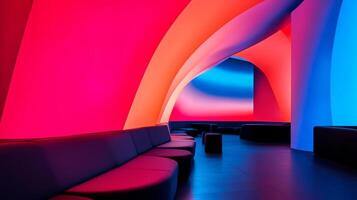 Colorful interior of a modern lounge featuring vibrant light displays and curved architectural design in a contemporary setting photo