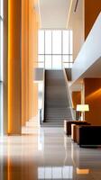 Modern lobby interior with elegant staircase and ambient lighting at a contemporary building during daytime photo