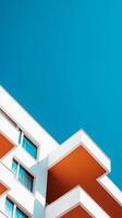 Modern architectural design featuring angular balconies against a bright blue sky in an urban setting photo