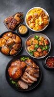 A delicious spread of roasted chicken and savory sides arranged on a dark table, perfect for family gatherings and celebrations photo