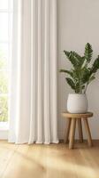 Serene indoor corner with white curtains and a leafy plant by a sunny window in a modern home setting photo