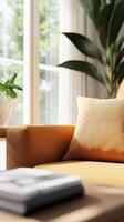 Cozy living room corner with sunlight streaming in, featuring a soft pillow and green plant by the window on a warm afternoon photo
