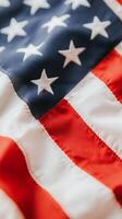 A close-up view of an American flag displaying its stars and stripes, representing national pride and symbol of freedom photo