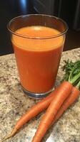 Carrot Juice and Fresh Carrots - A Healthy and Delicious Drink photo
