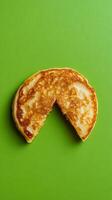 A mouthwatering slice of golden pancake photo