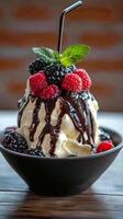 Gourmet Ice Cream Dessert with Berries and Chocolate Sauce photo