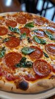 Tasty Pepperoni Pizza Topped with Fresh Basil photo