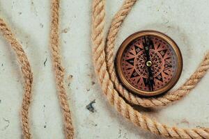 Compass on a gray gradient background photo