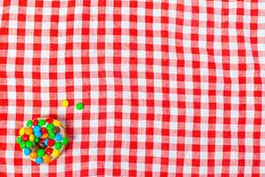 donut on a red table cloth. photo