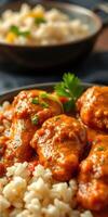 Tasty chicken curry served over steamed rice with fresh herbs for a delightful meal photo