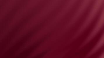 Deep red fabric has subtle folds and soft light. video