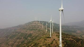 Aerial drone view of the wind turbine field view video
