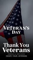 Veterans Day celebration with American flag waving in remembrance of service members at a solemn gathering photo