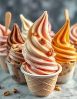 Delicious soft serve ice cream in a variety of flavors displayed on a marble countertop photo