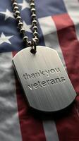 Dog tag displaying gratitude for veterans on an American flag background photo
