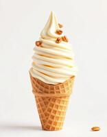Delicious waffle cone filled with creamy soft serve ice cream topped with crunchy pieces photo