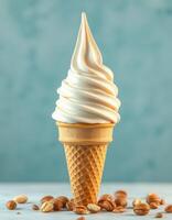 Perfectly swirled soft serve ice cream cone with nuts on a light blue background photo