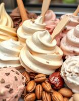 Assorted ice cream cones and scoops displayed artistically with nuts and toppings in a vibrant setting photo