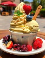 Frozen dessert topped with fresh fruits and nuts enjoyed in a sunny outdoor setting photo