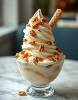 Whipped ice cream dessert topped with pecans served in a glass bowl in a cozy cafe setting photo