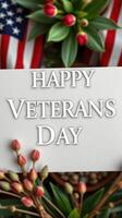 Celebration of Veterans Day with flowers and American flags displayed in a warm setting photo