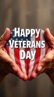 Hands holding a heart-shaped symbol with American flag design celebrating Veterans Day in a heartfelt tribute photo