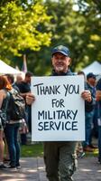 Veteran appreciation event where attendees express gratitude towards military service in an outdoor setting photo