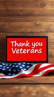 Celebrating veterans with a heartfelt message on a laptop against a wooden backdrop photo