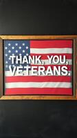 Display of patriotic gratitude featuring a flag and heartfelt message honoring veterans photo