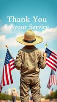 Child holding American flags in support of military service members at a public celebration photo