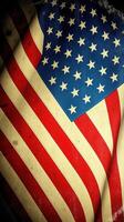 Old glory waving in the wind with vibrant colors and visible texture showing patriotism and heritage photo