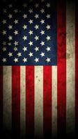 Vintage American flag with weathered texture displayed on a dark background photo