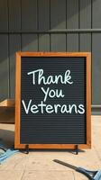 Thank you veterans display sign in outdoor setting honoring military service on a sunny day photo