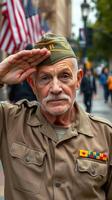 Veteran salutes at a patriotic parade in downtown during a crisp afternoon amidst waving flags photo