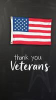 Display of appreciation for veterans with American flag on a blackboard backdrop photo