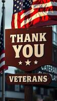 Community honors veterans with gratitude sign in town square on a sunny day photo