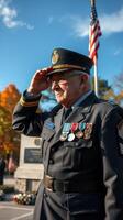 Veteran salutes flag during memorial ceremony in autumn at local park photo