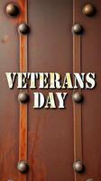 Celebration recognizes Veterans Day with artistic display on a textured brown background featuring bold lettering photo