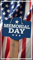 Memorial Day sign in front of American flag displays patriotic spirit and commemorates fallen heroes photo