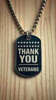Veterans appreciation tag displays gratitude with five stars design on wooden surface background photo