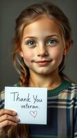 Young girl expresses gratitude to veterans with heartfelt message during remembrance event photo