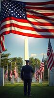 Honor and remembrance at the memorial with flags and monument during bright daylight photo