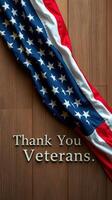 Veterans honored with a traditional American flag draped on a wooden surface during a tribute event photo
